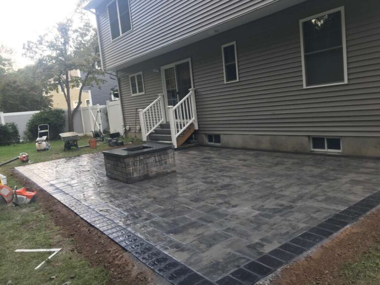 Large backyard paver patio with fire pit in Cedar Grove NJ