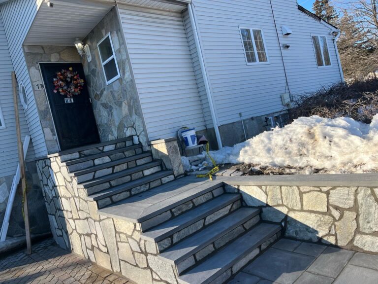 Stone front entrance steps with masonry walls in New Jersey