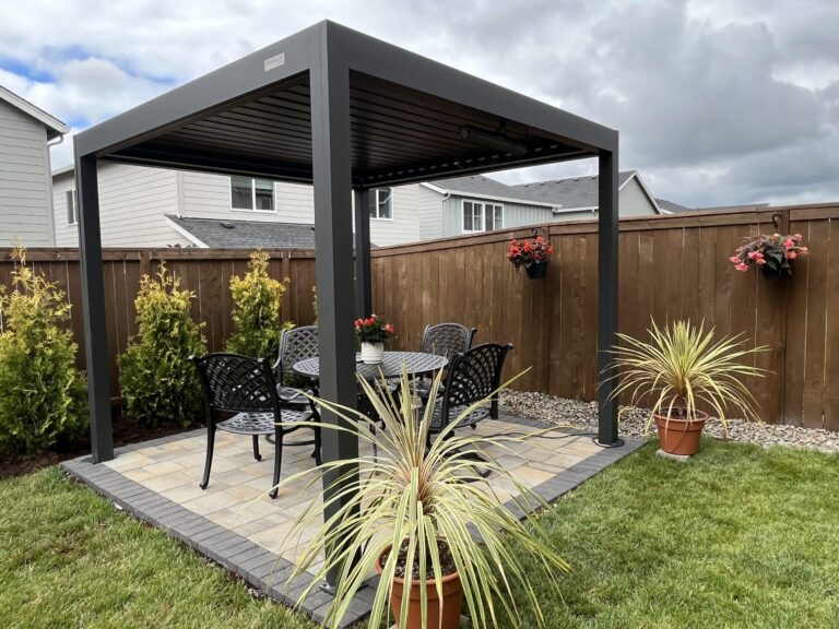 Backyard paver patio with modern pergola