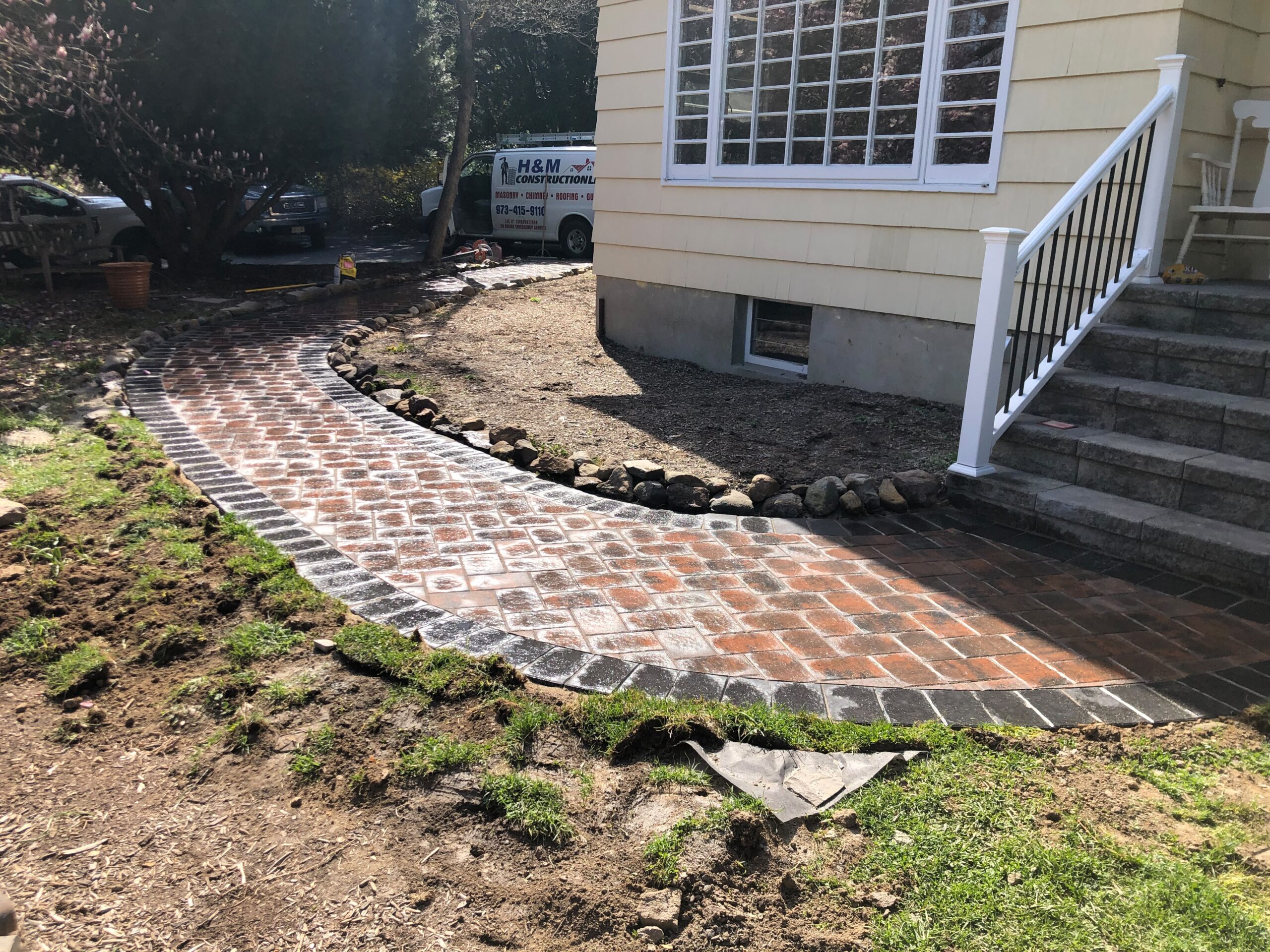 Curved paver walkway with dark border in Sparta NJ