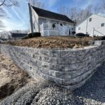 Finished curved stone retaining wall