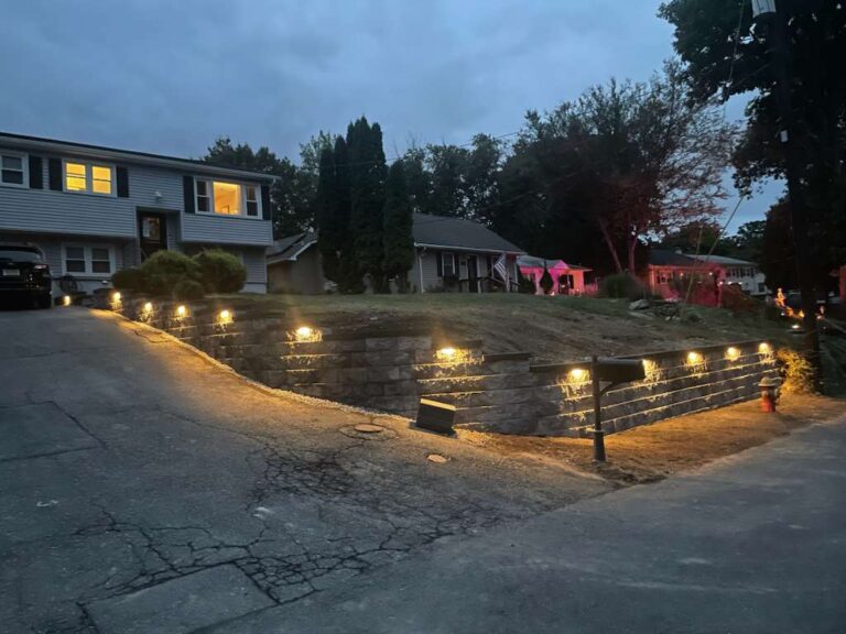 Retaining wall with integrated landscape lighting in Lake Hopatcong NJ