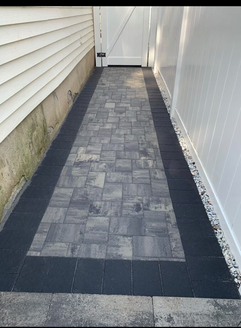 Side yard paver walkway with dark border