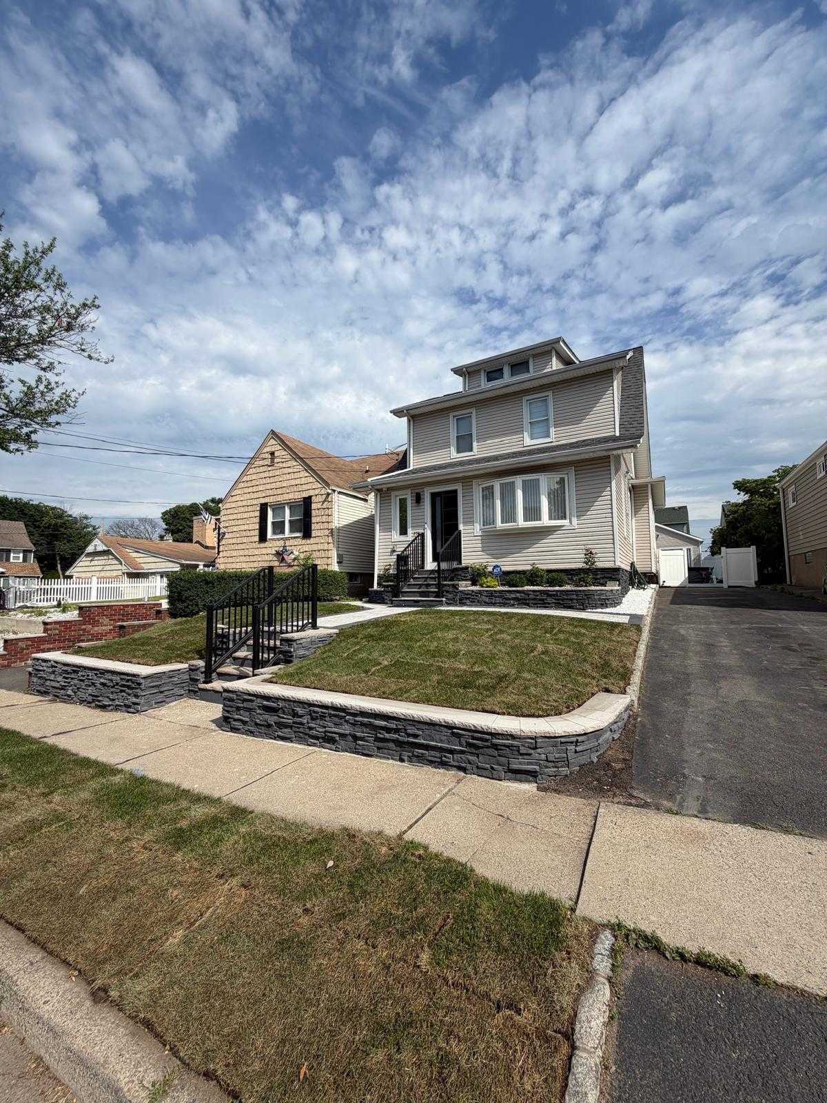 Front yard retaining walls and masonry steps in Clifton NJ