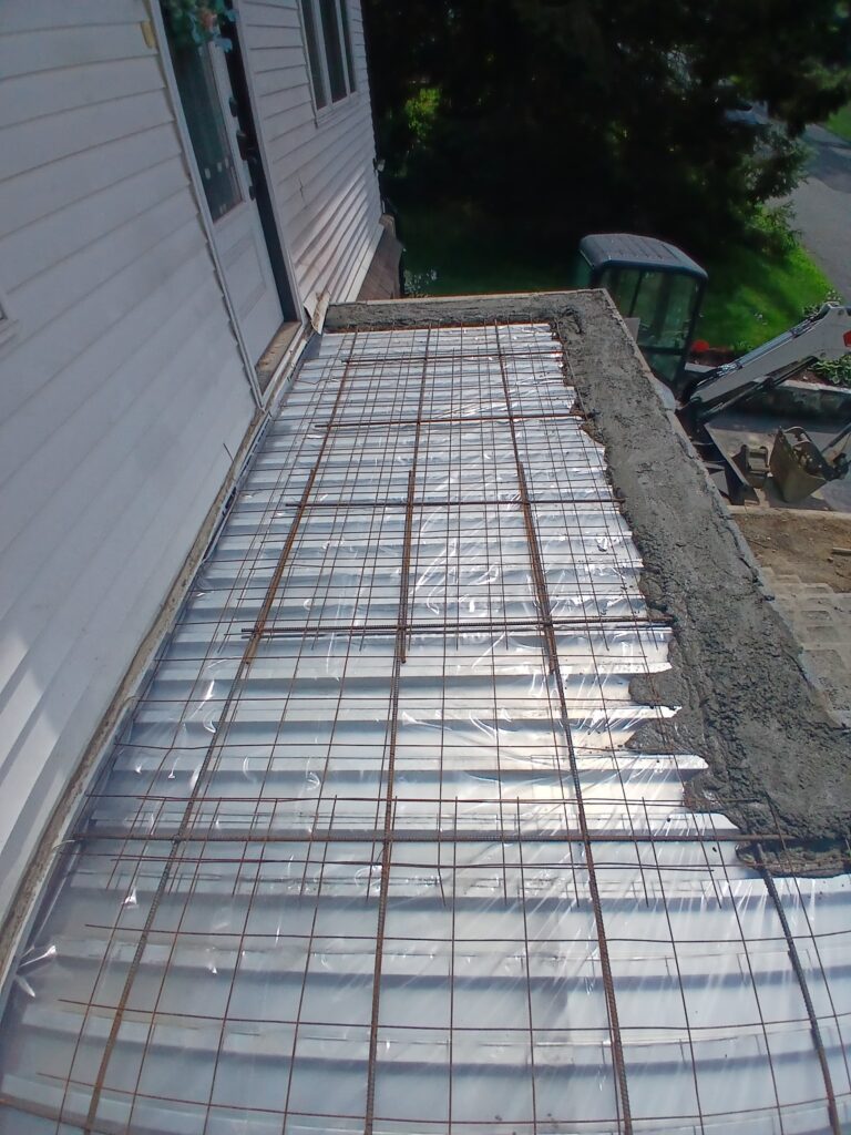 Steel reinforcement prepared for a concrete foundation slab