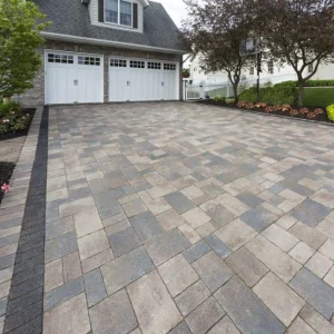 Gray paver driveway with dark border in New Jersey