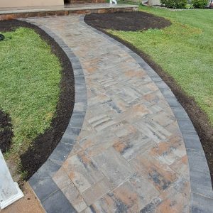 Curved paver walkway with gray border