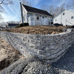 Finished curved stone retaining wall