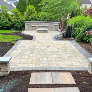 Paver patio with custom stone seating walls